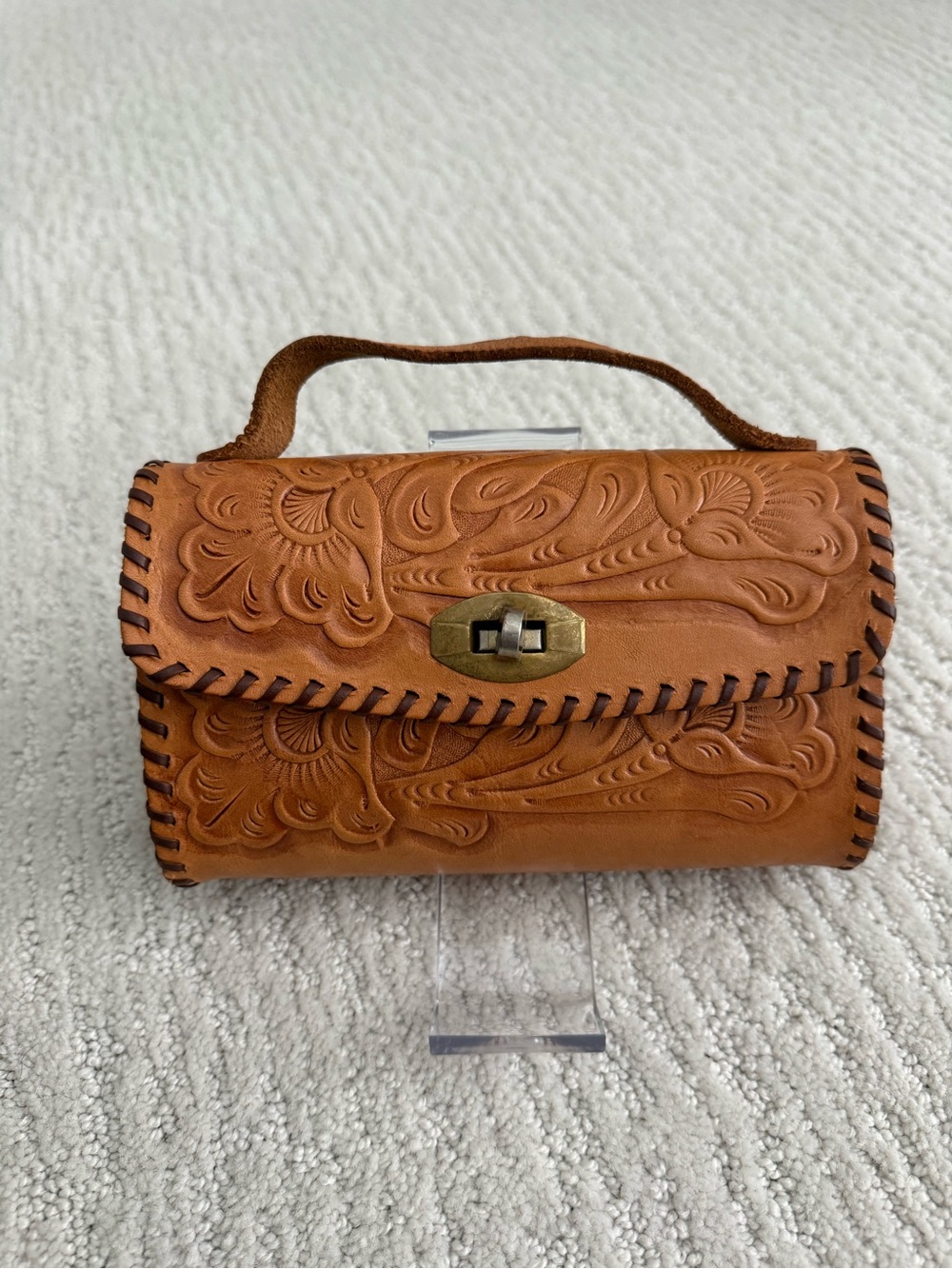Tooled leather mini top handle bag